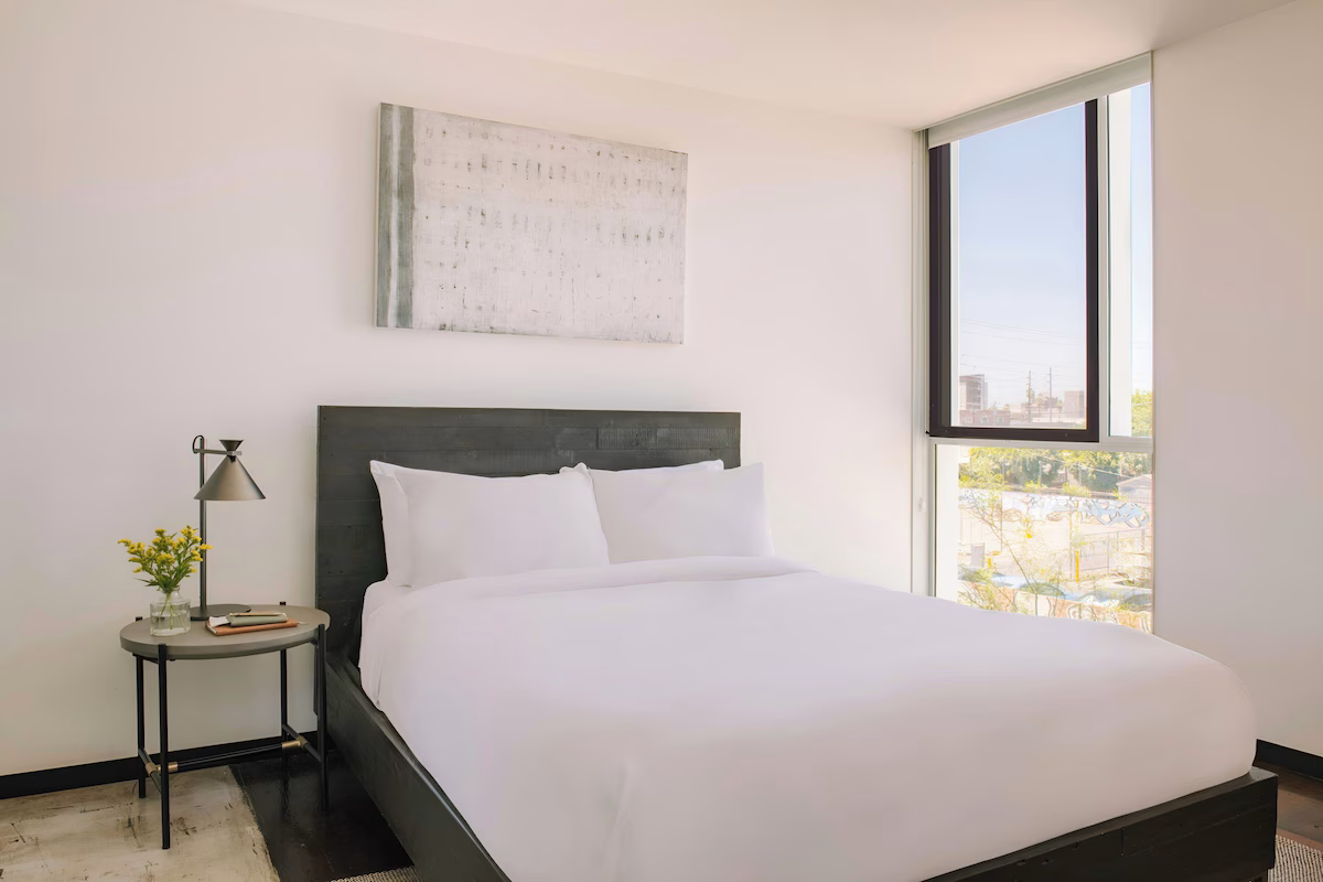 An accessible one-bedroom stay living area with modern finishes.